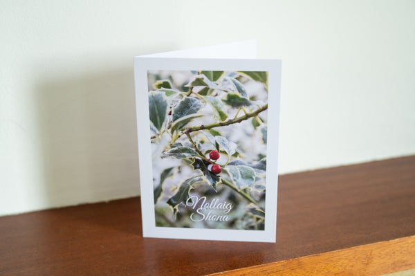 Holly tree Irish-made Christmas card featuring Nollaig Shona greeting