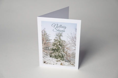 Snowy Forest Irish-made Christmas card featuring Nollaig Shona greeting