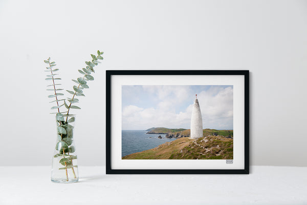 A contemporary black framed print of The Baltimore Beacon in West Cork on the Wild Atlantic Way