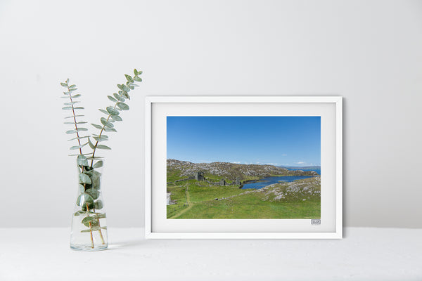 A White Framed Contemporary Irish Landscape Print of Three Castle Head in West Cork