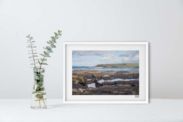 A white framed irish landscape photograph of Kilkee Bay in County Clare on the Wild Atlantic Way